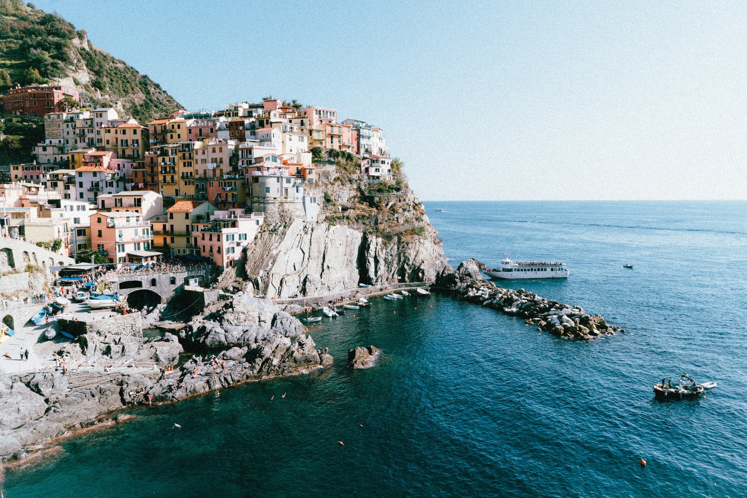 Colorful cliffside village of Manarola in Cinque Terre overlooking the Ligurian Sea in Italy