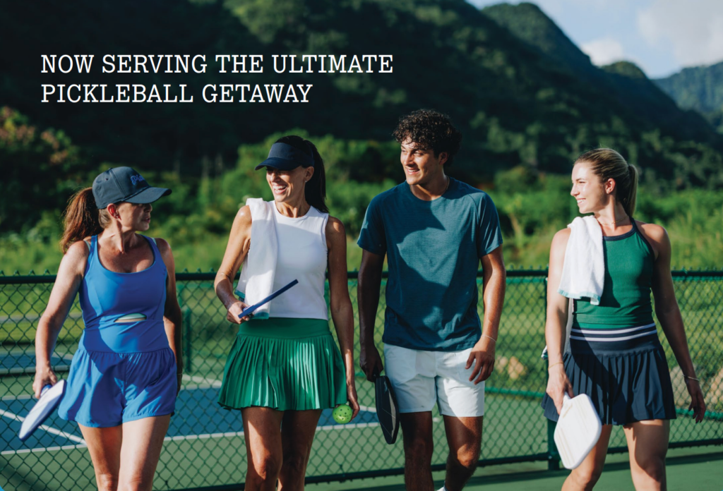 Group of friends walking off a pickleball court at a tropical resort, enjoying a relaxed pickleball group trip getaway