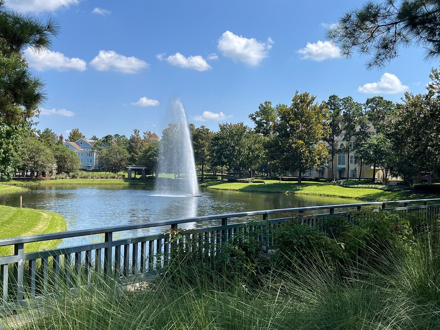 Scenic waterfront view with fountain at Disney’s Saratoga Springs Resort