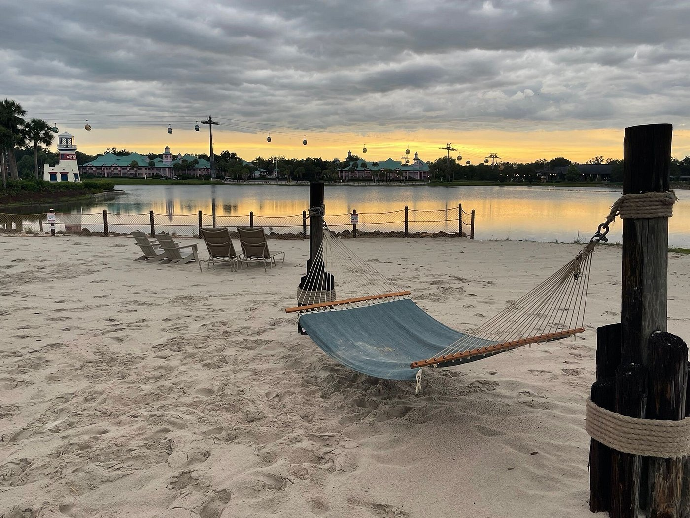 Relaxing hammock and beach seating area at Disney’s Caribbean Beach Resort by the water